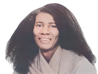 A color photograph of Alice Coltrane.