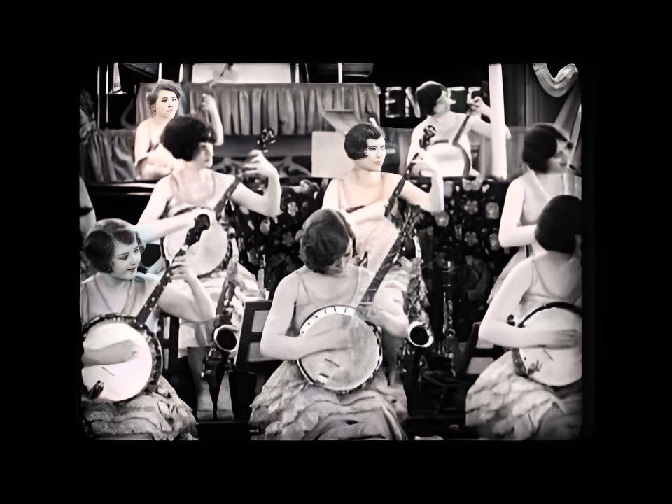 An enhanced photograph of eight of The Ingenues visible seated while playing their banjos.