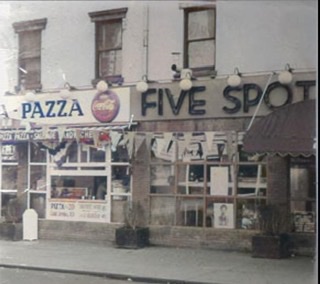 A colorized photograph of the outside front of the Five Spot Cafe in New York City.