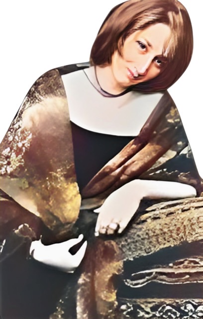 A black and white photograph of Renee Rosnes wearing a shawl.