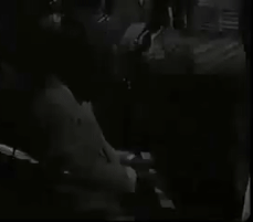 Duke EllingtonAtPianoTurnsSmiling1.gif