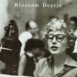 An animated .gif of the album cover for the debut album of "Blossom Dearie" (Verve 1957) with a picture of Dearie wearing glasses on the cover moving her head left and right against the non-moving background.