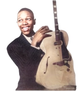 A colorized black and white photographic cutout of Charlie Christian smiling and holding his guitar in front of himself with the neck pointing straight up.