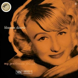 The album cover for "My Gentleman Friend" by Blossom Dearie with her head dominating the cover and she is resting her chin on her hand and staring dreamily outward.