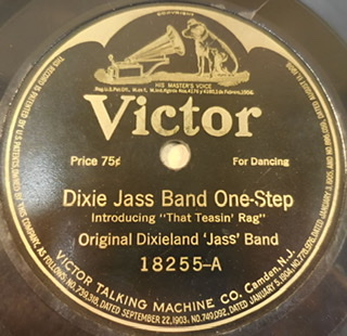 A photograph of a brown record label with yellow writing of the RCA Victor record label of "Dixie Jass Band One-Step from 1917.