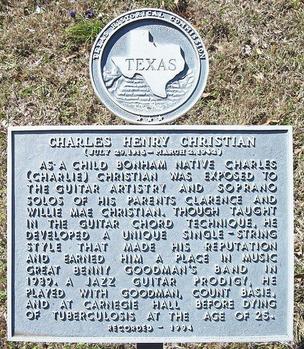 A photograph of the Fannin County Historical Commission plaque made for Charlie Christian in Bonham, Texas.