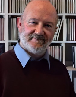 An enhanced color photograph of a headshot of Stephen Davies.