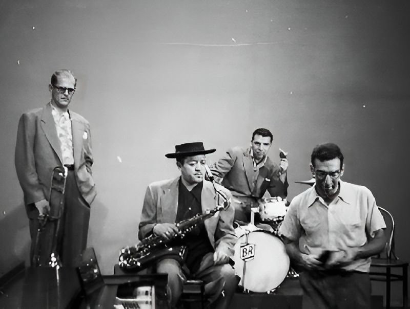 An enhanced black and white photograph of the Lester Young quartet with Young second from left.