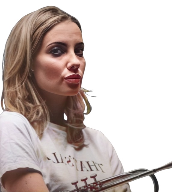 An enhanced and multiply colorized and blended photographs into one of English trumpeter Lily Carassik wearing a white t-shirt and holding her trumpet below her chest looking to viewer's right.