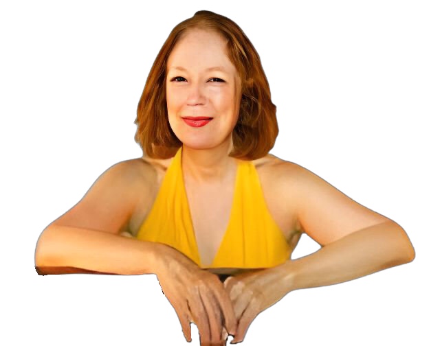 A color photograph of Connie Crothers with crossed arms and wearing a shoulderless yellow dress in front of a piano.