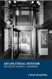 The book cover for Art and Ethical Criticism edited by Garry L. Hagberg with the title in white font on a dark blue background at the bottom fourth of the cover with a photograph of a two story building with an open door on the first floor looking down a long gray corridor.
