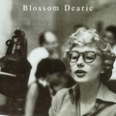 An animated .gif of the album cover for the debut album for "Blossom Dearie" (Verve 1957) with a picture of Dearie wearing glasses on the cover with her head moving relative to the background closer and farther away.