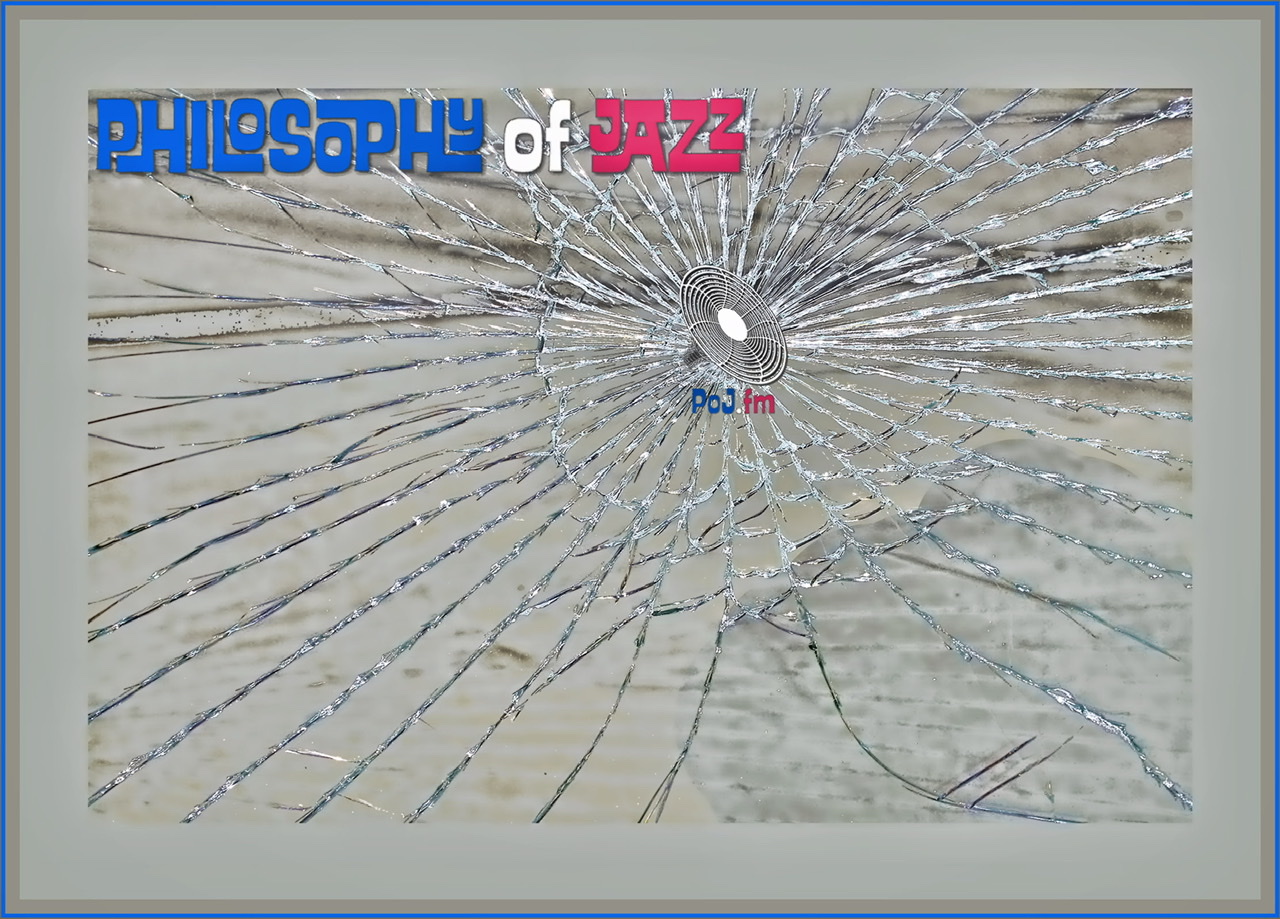 A framed color photograph by Matthew Priest of a single pane of glass with an impact crater contains the PoJ.fm logo and glass cracks emanating out from it.