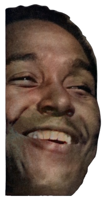 A colorized photographic cutout of the head of Charlie Parker facing to his left and with broad smile with eyes mostly closed.