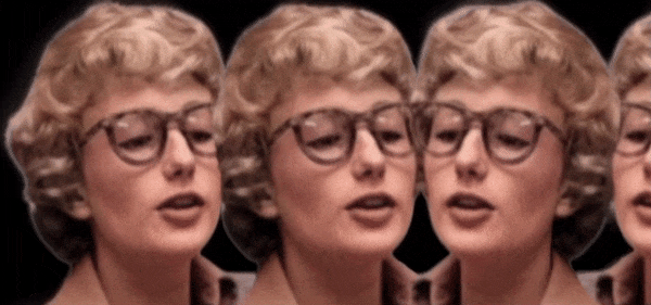 An animated .gif of four identical colorized headshots of two Blossom Dearie's on left with two looking back on right slowly nodding their heads.