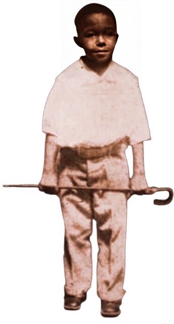 An enhanced and colorized photograph of a pre-teen Charlie Parker standing and holding a cane across his knees horizontally.
