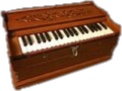 A photograph of the musical instrument called an Indian harmonium that looks like a brown wooden box with a keyboard on top with fifteen black keys and the rest white for a total of thirty-five keys 🎹.