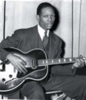 CharlieChristianSittingGuitarInLap1.jpeg