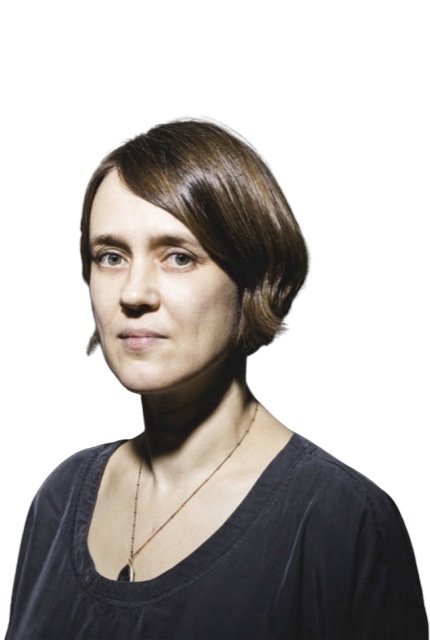 A color photograph of Ingrid Laubrock while not playing.