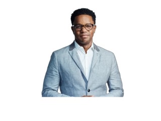 A cutout of Stefon Harris from the waist up facing forward wearing a light blue sport coat with an open at neck white shirt.